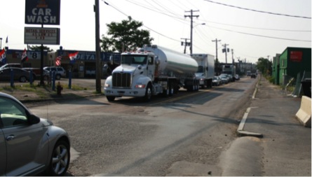 FIGURE 14. Traffic Queue on Second Street, Approaching Route 16
Figure 14 shows a gasoline tanker semi-trailer, two single-unit refrigerated trucks, and six cars waiting for a green light.