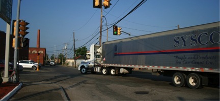 FIGURE 15. Truck Turning Left from Carter Street onto Everett Avenue after Exiting US Route 1 Southbound
Figure 15 shows a refrigerated semi-trailer in the middle of an intersection.