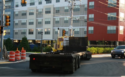 FIGURE 7. New Luxury Housing on Spruce Street in Chelsea: Flatbed Truck Turning onto a Northbound On-Ramp to US Route 1
The truck mentioned in the title of Figure 7 is turning onto a street directly in front of the housing mentioned in the title.